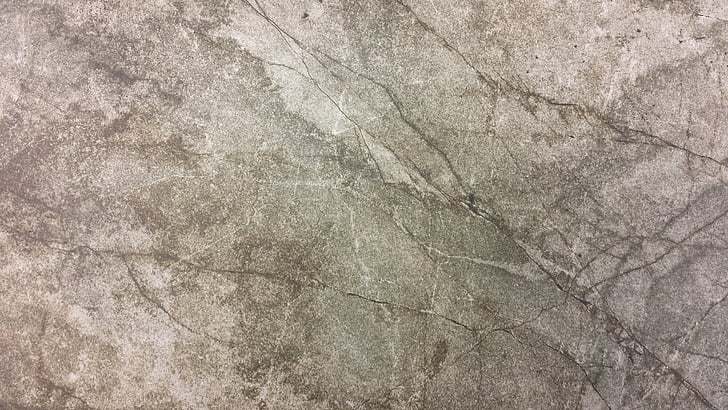 Old concrete floor Concrete floor that could be made with self healing concrete, offering a durable and long-lasting surface by repairing cracks autonomously